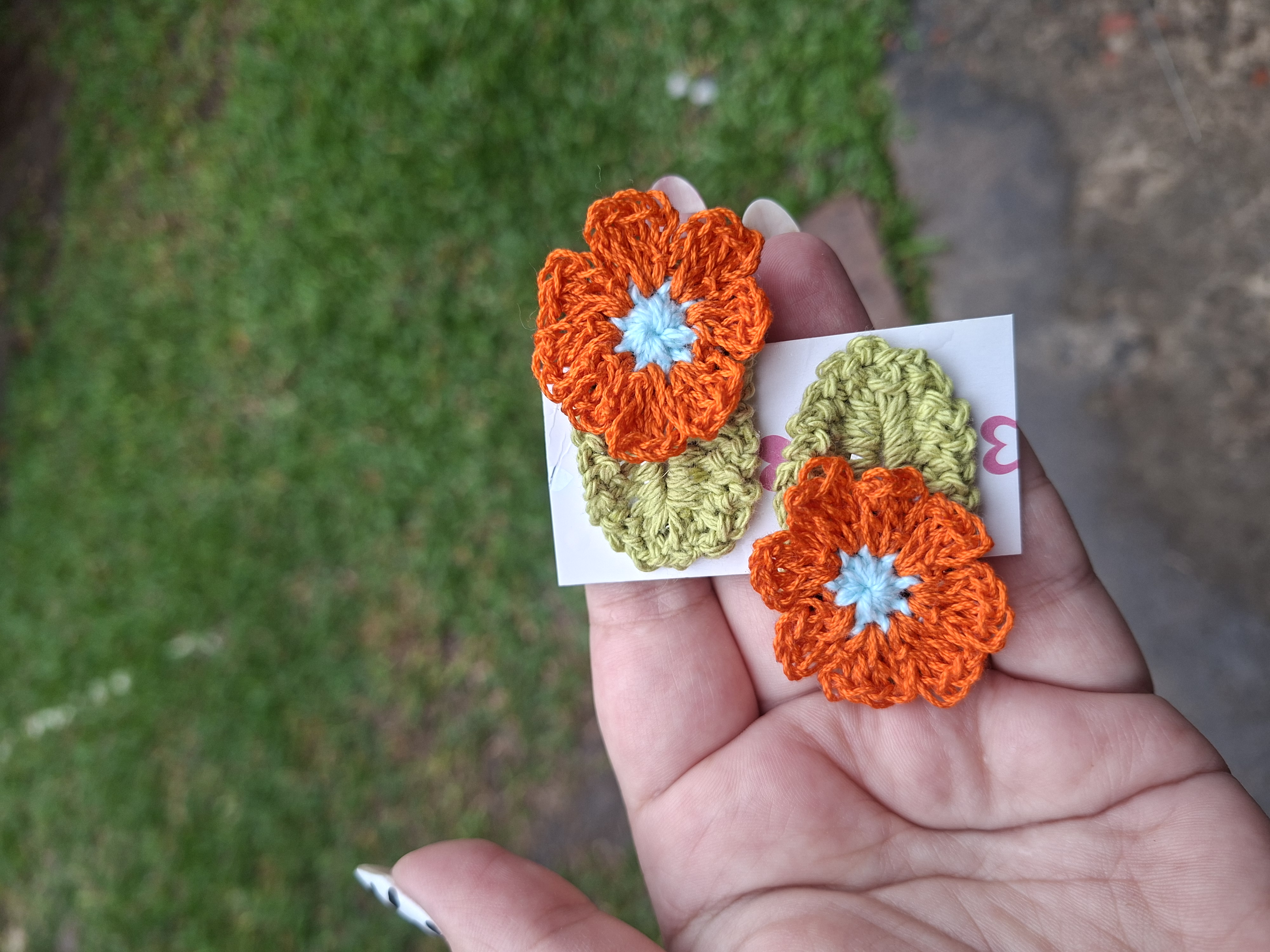 Hebilla flor naranja